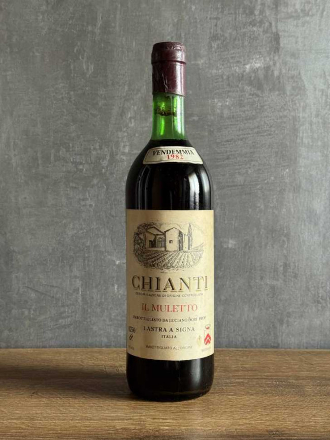 Вино Luciano Dori Chianti Il Muletto 1982 года. Вино Luciano Dori Chianti Il Muletto 1982 года.